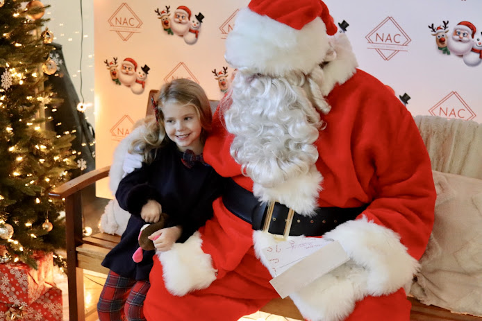 Little girl and Santa Claus